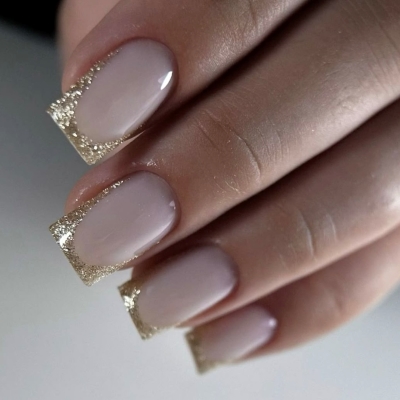 elegant French manicure with glitter
